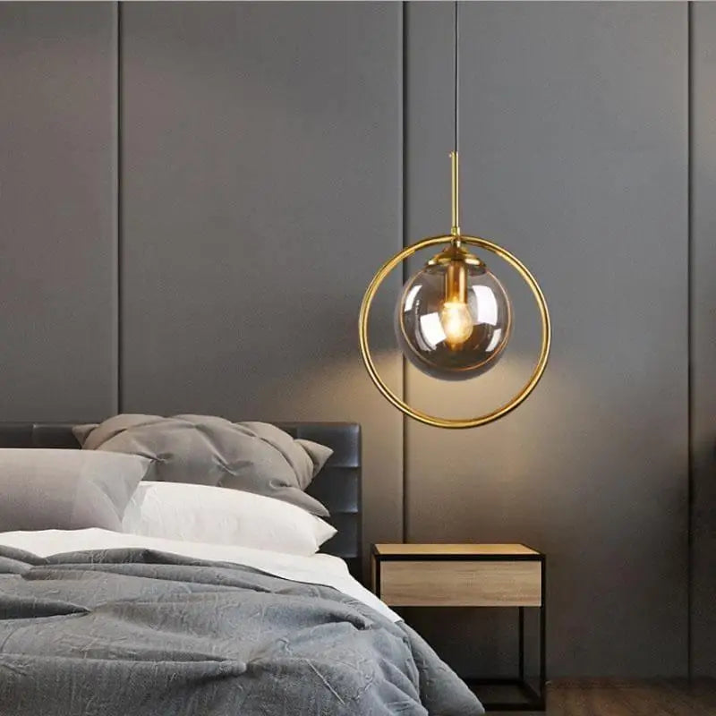suspension verre fumé, luminaire boule design, suspension sphérique moderne, lampe suspendue verre teinté, luminaire fumé élégant, éclairage verre fumé, suspension moderne salon, suspension verre chambre, luminaire déco cuisine, suspension en verre gris, boule lumineuse suspendue, suspension minimaliste fumée, suspension design intérieur, luminaire contemporain verre, suspension tamisée ambiance