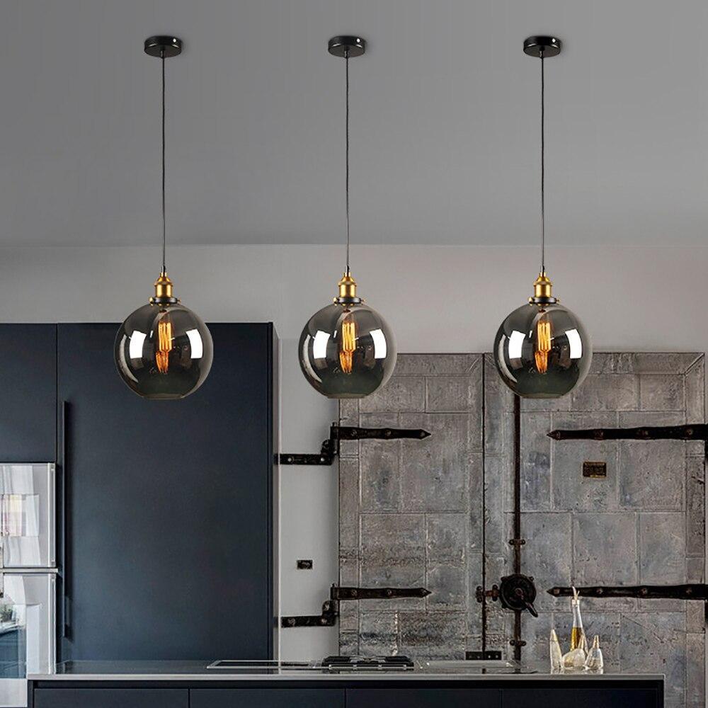 suspension verre fumé, luminaire verre fumé, suspension luminaire design, suspension élégante salon, suspension fumée chambre, lampe suspendue verre teinté, luminaire suspendu moderne, suspension lumière douce, suspension cuisine verre fumé, éclairage verre fumé, suspension verre fumé LED, suspension verre fumé industriel, lampe suspendue esthétique, suspension tendance déco, suspension verre fumé salle à manger