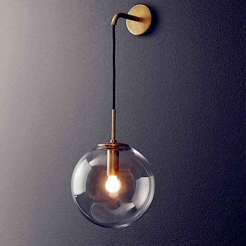 applique murale, applique murale boule, lampe murale en verre, éclairage intérieur, luminaire design, applique moderne, lampe sphérique, applique dorée, applique noire, éclairage décoratif, lampe murale LED, luminaire élégant, lumière douce, éclairage économique, décoration murale