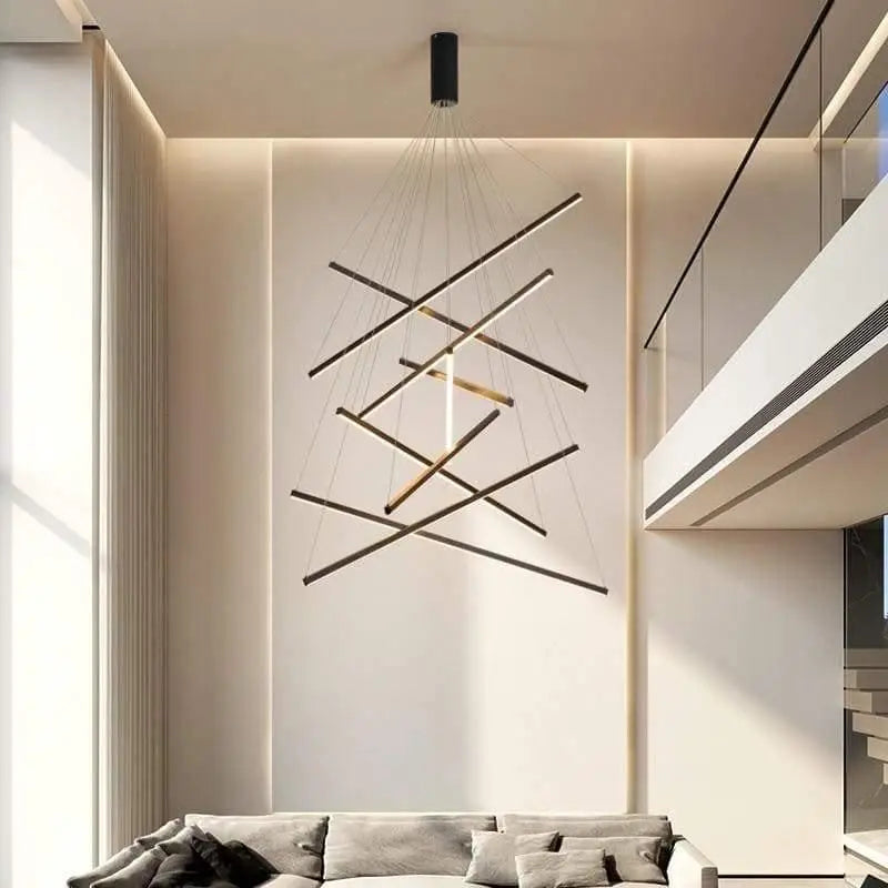 suspension escalier design, luminaire XXL escalier, suspension cascade lumineuse, suspension moderne escalier, éclairage escalier intérieur, lustre escalier haut plafond, suspension escalier maison, luminaire grande hauteur, lampe suspendue escalier, suspension LED escalier, suspension verticale escalier, luminaire escalier contemporain, éclairage suspendu escalier, suspension déco escalier, suspension longue pour escalier